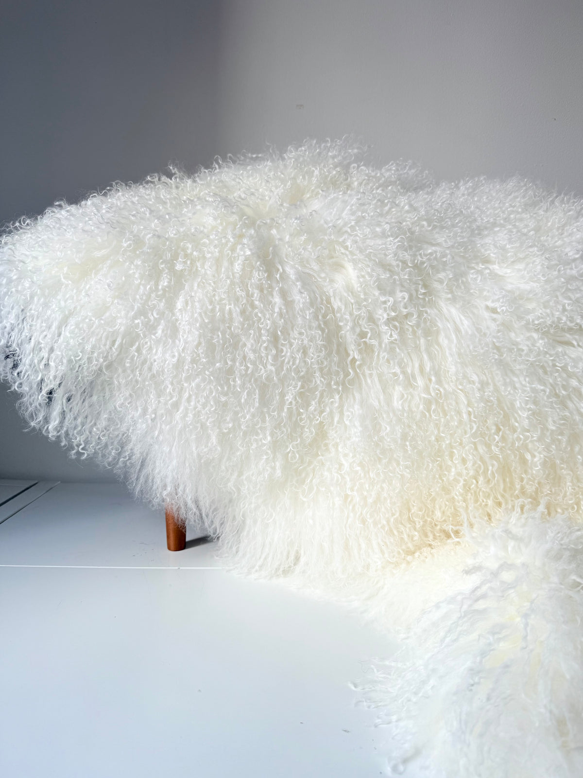 Natural Mongolian fur single throw, side view