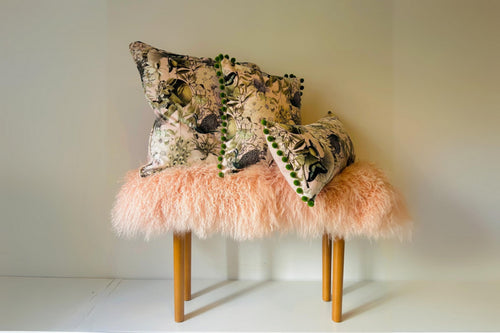 Handmade blush pink Mongolian fur bench styled with Luxe Fusion botanical cushions with pom-pom trim [main]