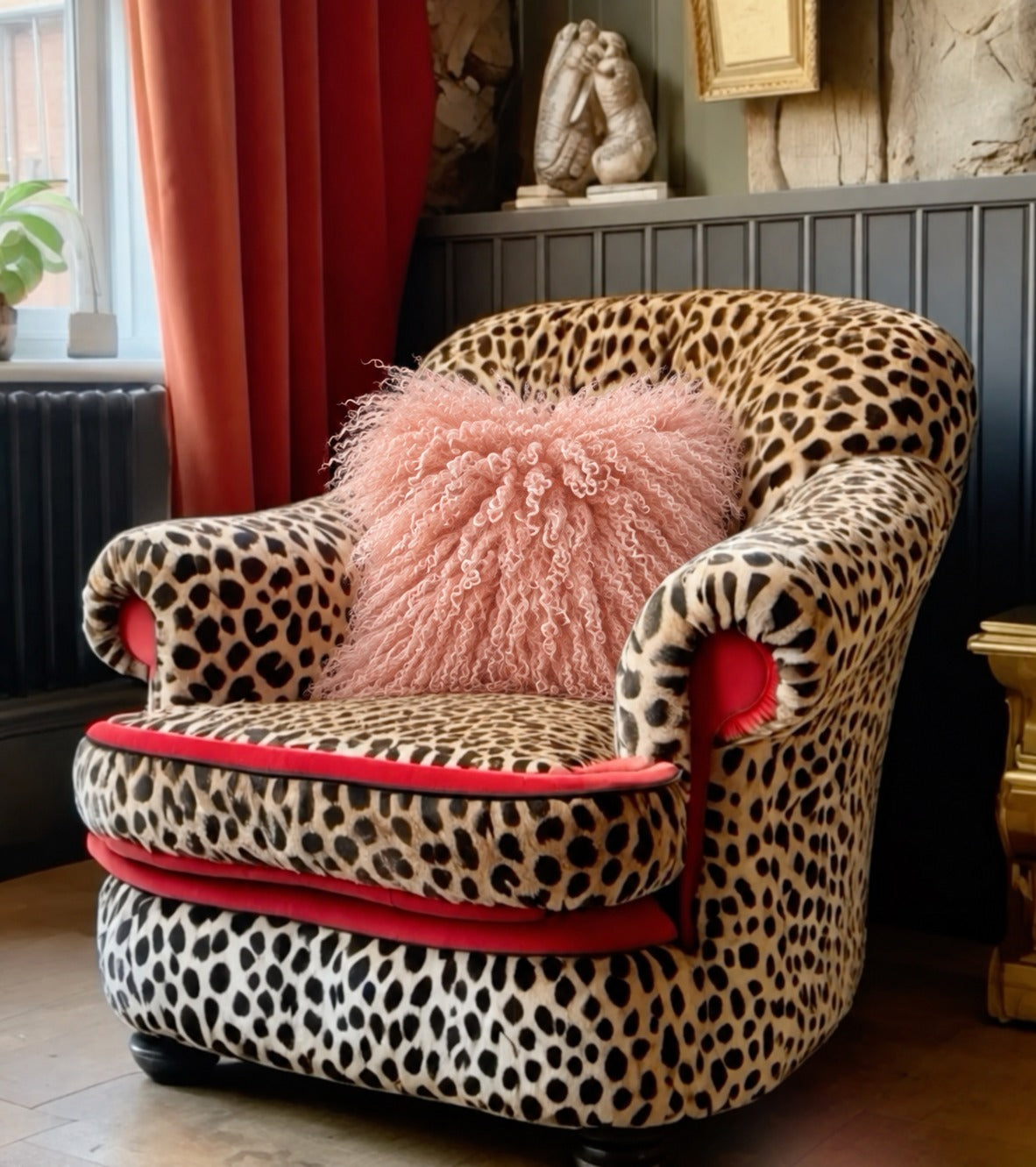Blush pink Mongolian fur cushion, 45cm, on a leopard print armchair - handmade pale pink curly lamb fur cushion