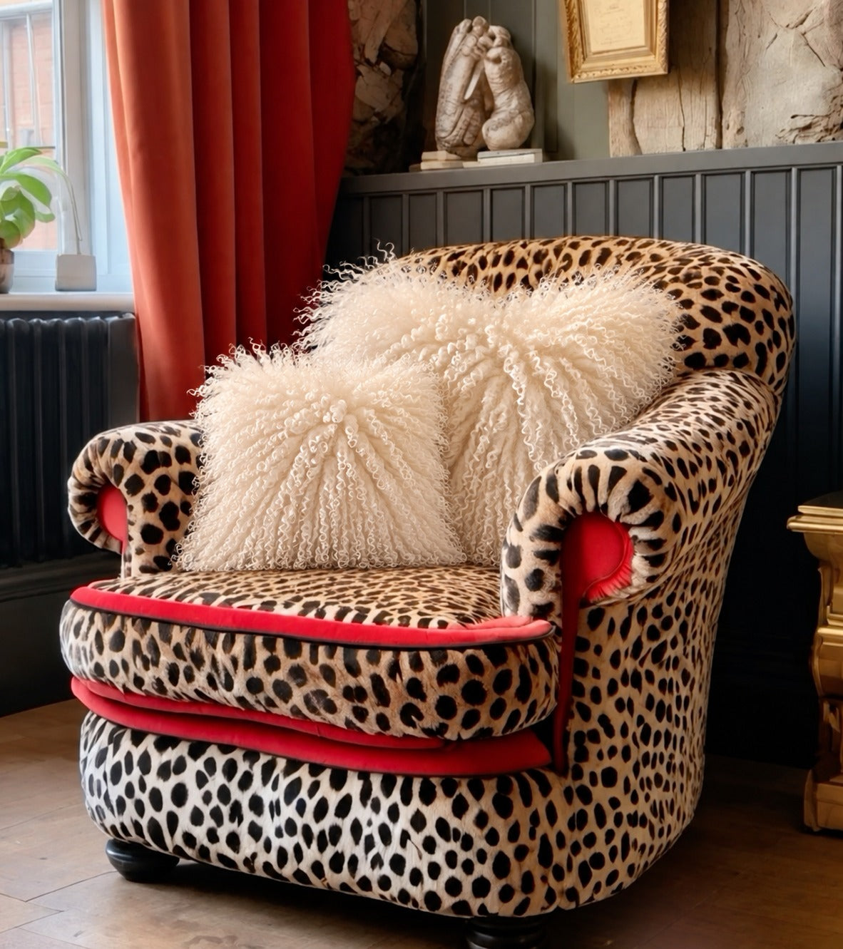 Natural Mongolian fur cushions, 45cm and 60cm, on a leopard print armchair - handmade fluffy natural ivory curly lamb fur cushions